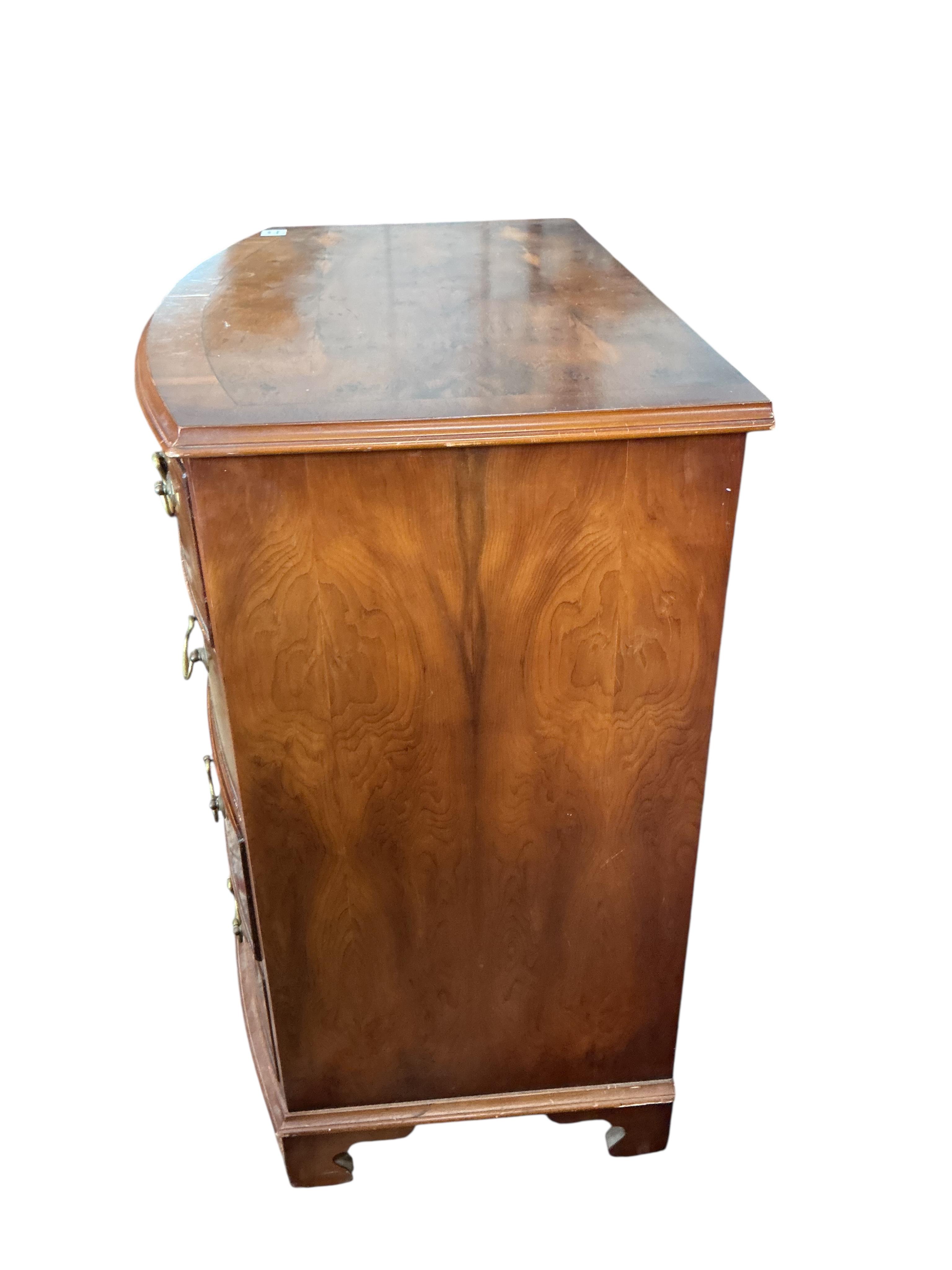 A small reproduction Regency style yew bowfront chest, width 86cm, depth 50cm, height 84cm